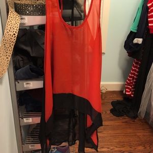 orange and black high low tank top